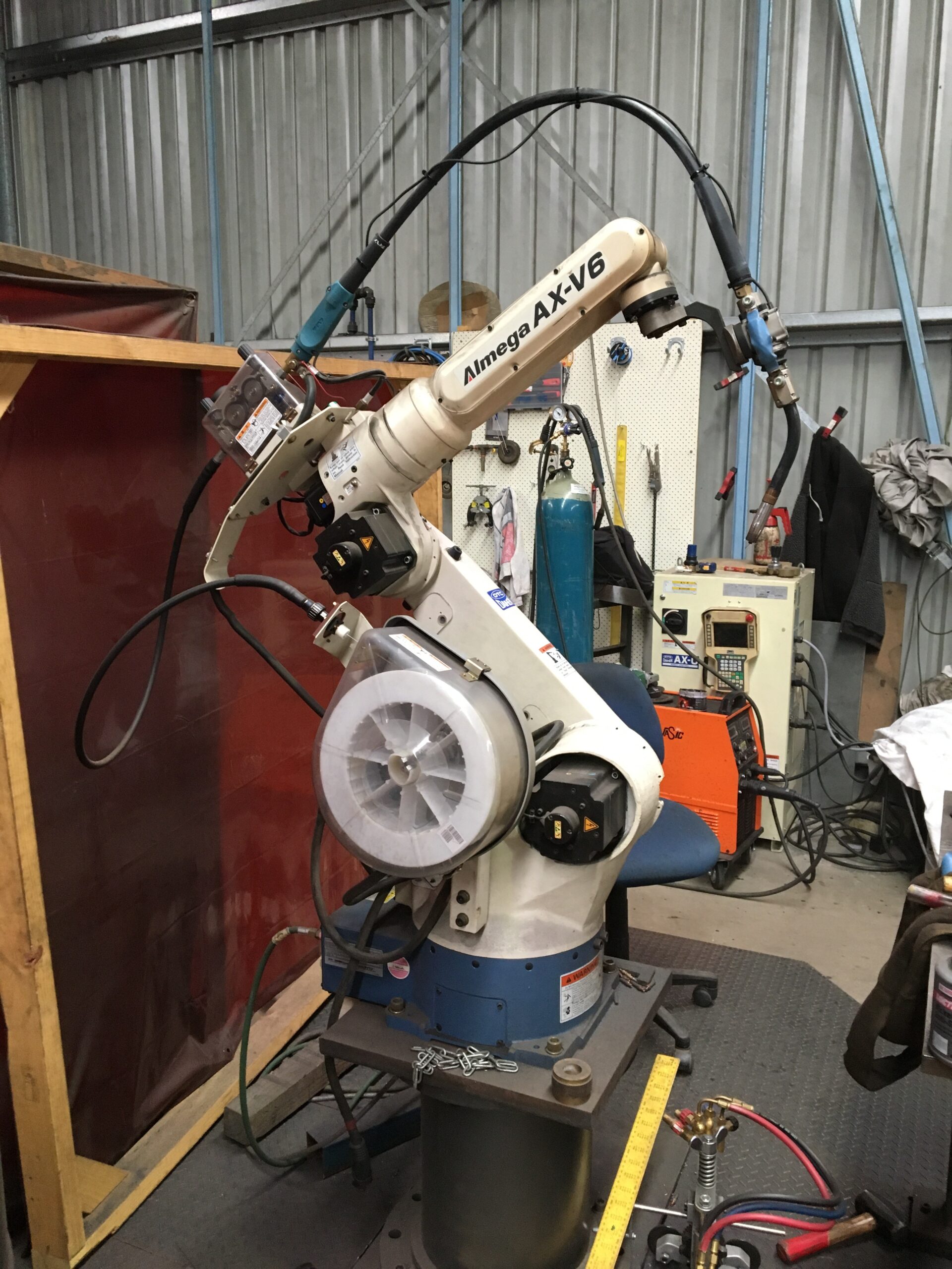 Industrial robot arm in workshop