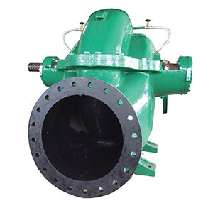 Large green mechanical pump machinery.